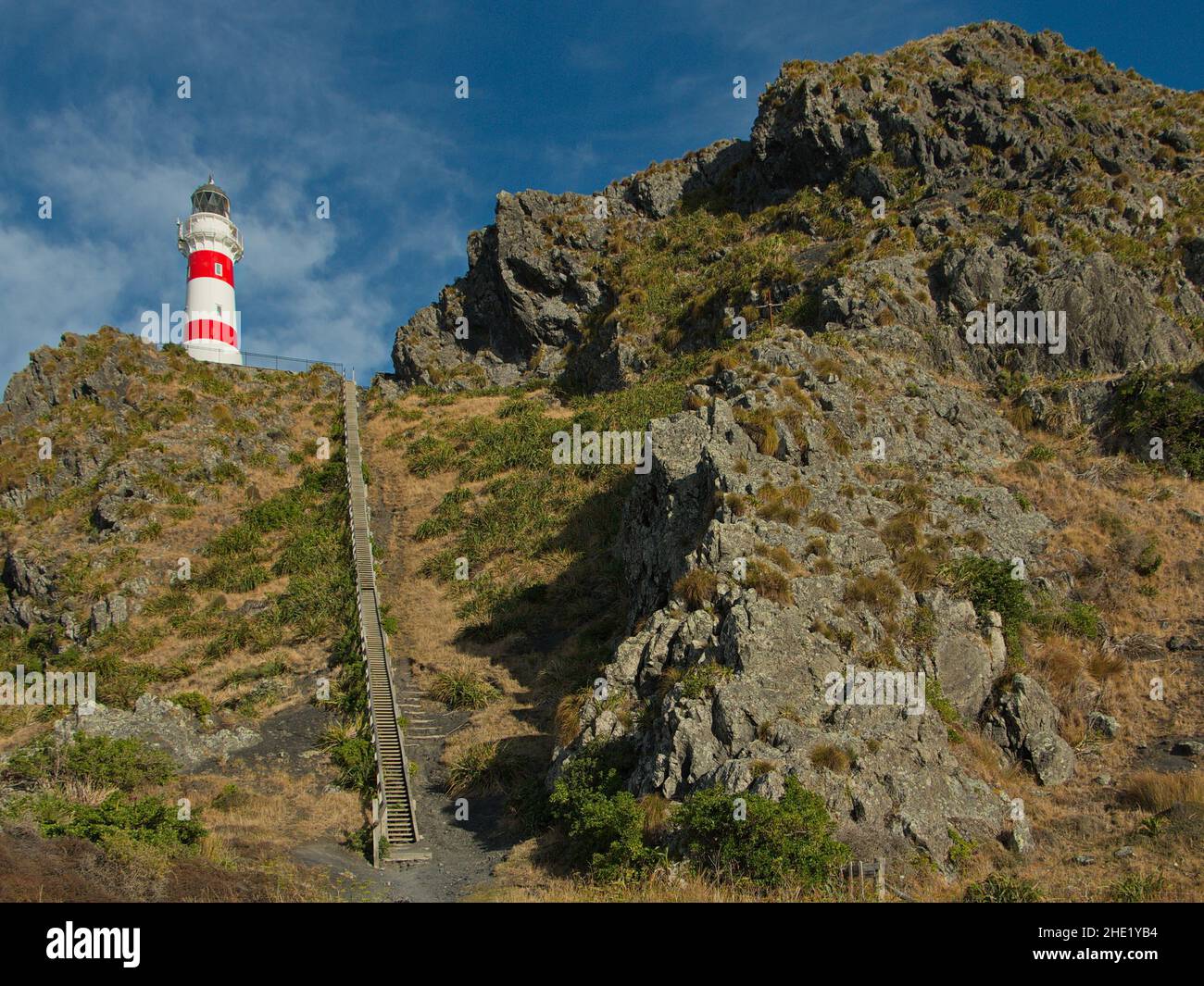 Faro di Cape Palliser nella regione di Wellington sull'Isola del Nord della Nuova Zelanda Foto Stock