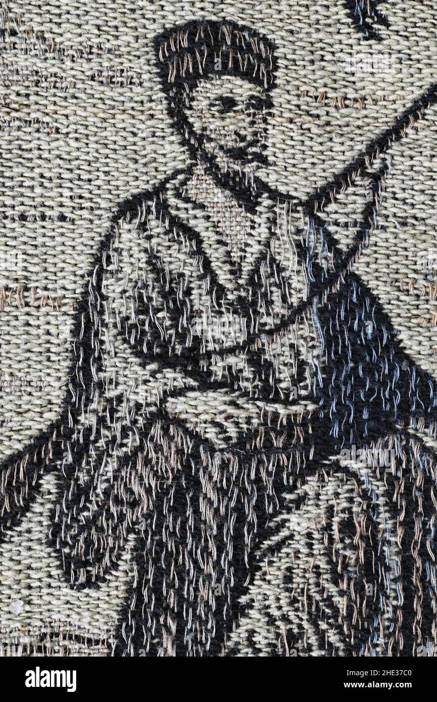 Guerriero orientale bearded su una coperta tessuta Foto Stock
