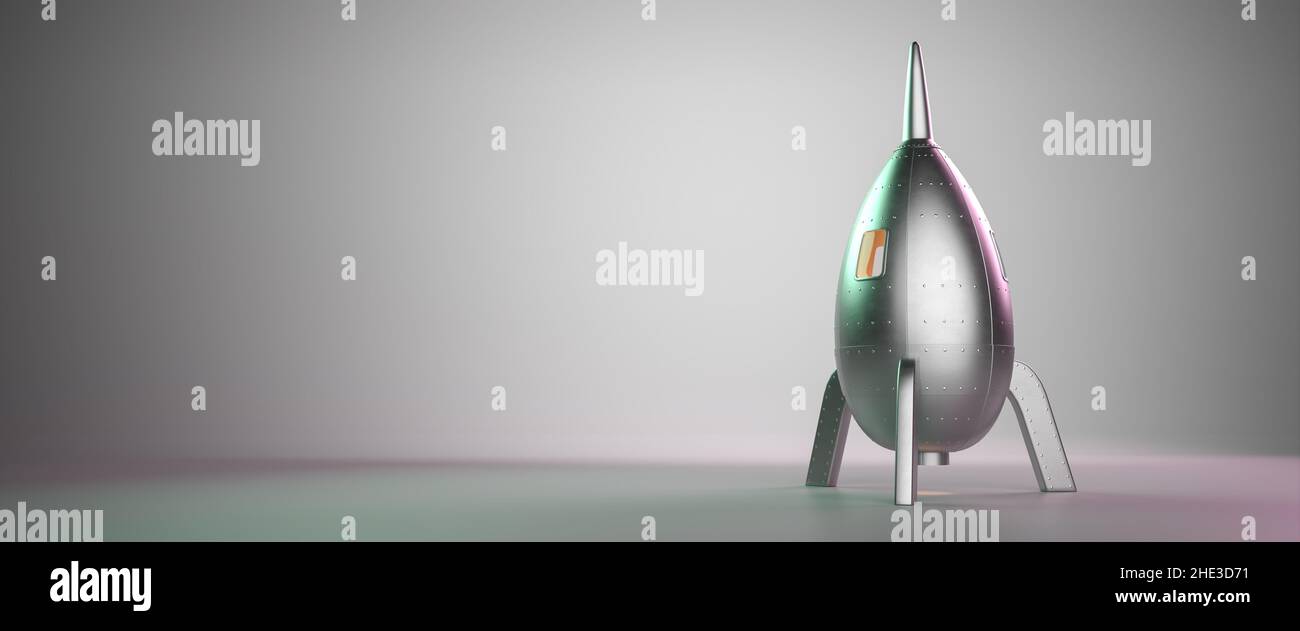 Un razzo giocattolo pronto per un lancio di successo. Concetto di startup, lancio di un prodotto, missione, successo. Formato banner Web Foto Stock Un razzo giocattolo pronto per un lancio di successo. Concetto di startup, lancio di un prodotto, missione, successo. Formato banner Web Foto Stock