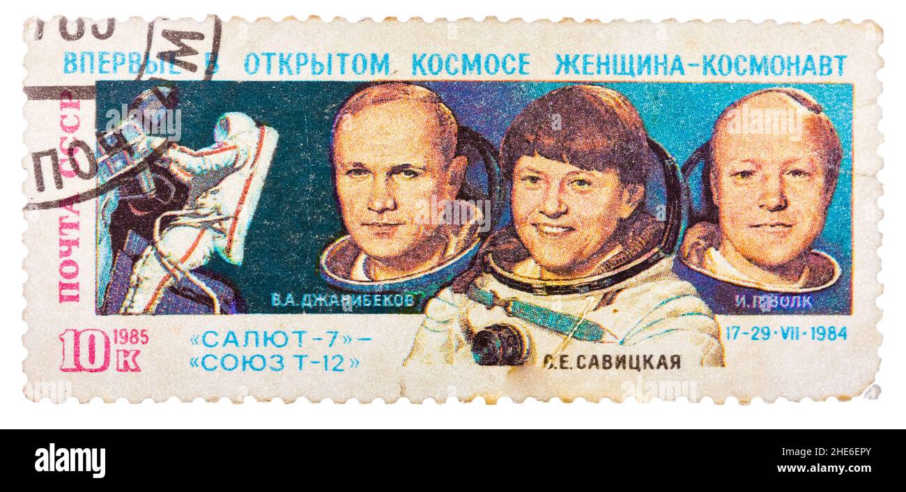 Il timbro postale stampato in URSS (Russia), mostra gli astronauti Janibekov, Savitskaya e Volk con le iscrizioni e il nome della serie 'Soyuz T-12, Salyut 7, Space Foto Stock
