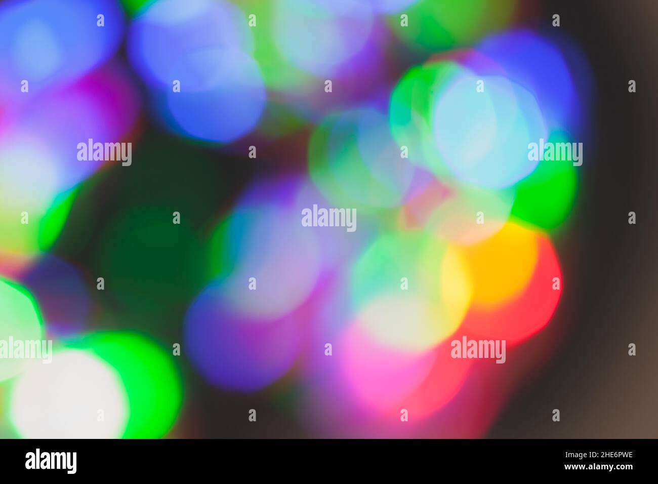 Foto astratta di sfondo con luci sfocate colorate, effetto bokeh Foto Stock