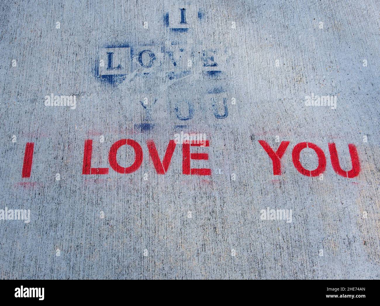 "Ti amo" stenced sul marciapiede Foto Stock