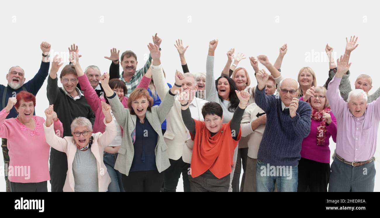 Gruppo di persone sorridenti con le mani in aria - isolato Foto Stock