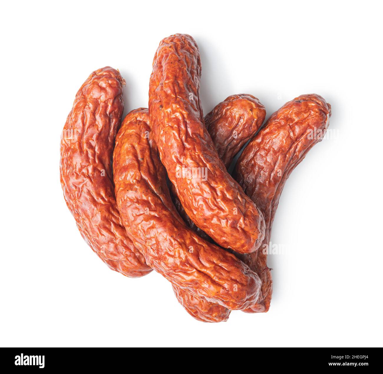 Salsicce di maiale affumicate isolate su sfondo bianco. Foto Stock