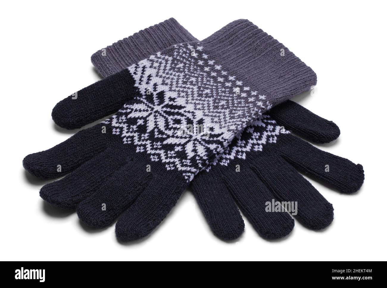 Paio di guanti invernali in tessuto tagliati su bianco. Foto Stock