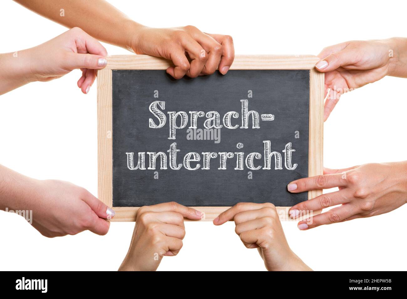 Molte mani tengono la lavagna con la scritta Sprachuntericht (tedesco per: Lezioni di lingua) come concetto di corso di lingua Foto Stock