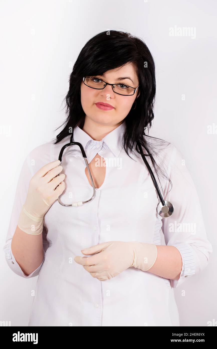 Medico con stetoscopio senza maschera protettiva e cappello. Concetto di protezione da Coronovirus Foto Stock