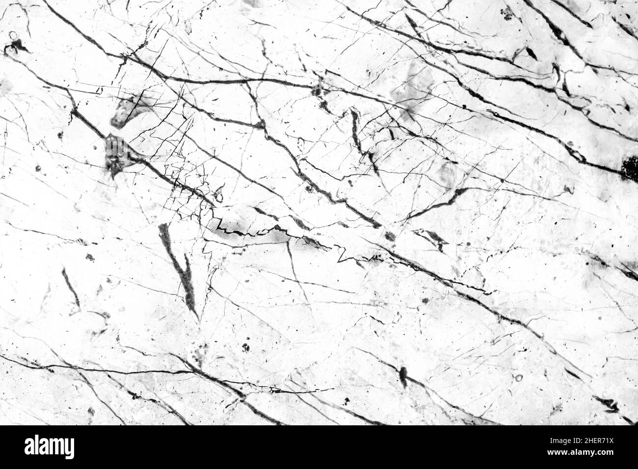 Marmo bianco con motivo nero astratto crepe superficie grunge parete texture sfondo. Foto Stock