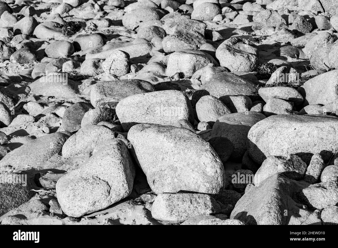 Lavati i ciottoli sulla spiaggia di Pebble Beach, USA Foto Stock
