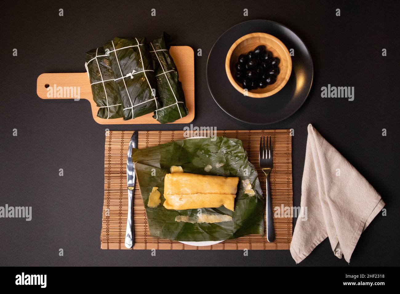 Hallaca al tavolo, il piatto tradizionale del Natale venezuelano Foto Stock