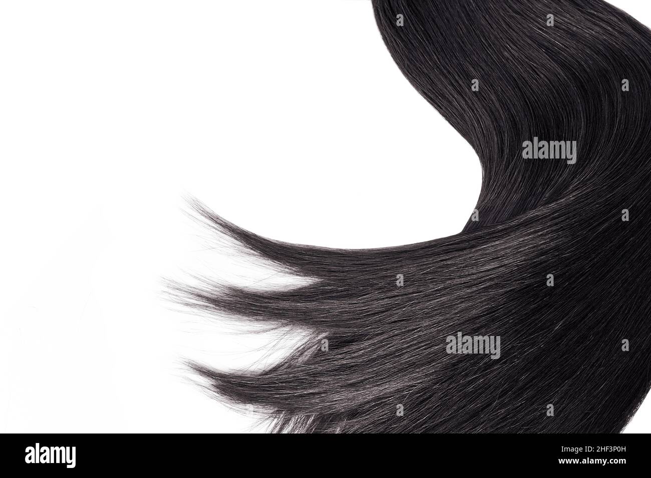 Capelli neri naturali, isolati su sfondo bianco, bellezza Foto Stock