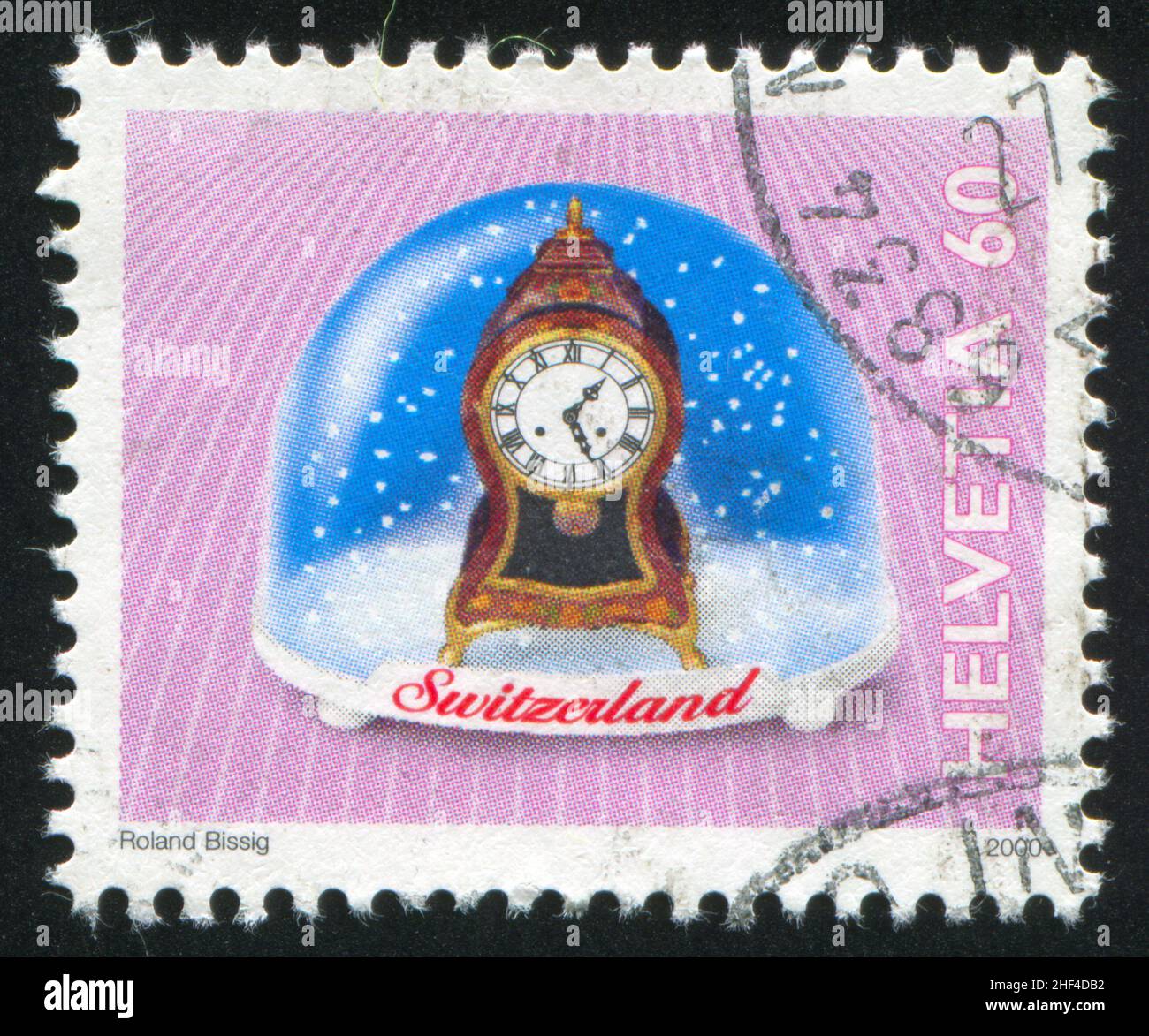 SVIZZERA - CIRCA 2000: Francobollo stampato dalla Svizzera, mostra Neuchatel “Pendule” orologio da parete, souvenir svizzeri, circa 2000 Foto Stock