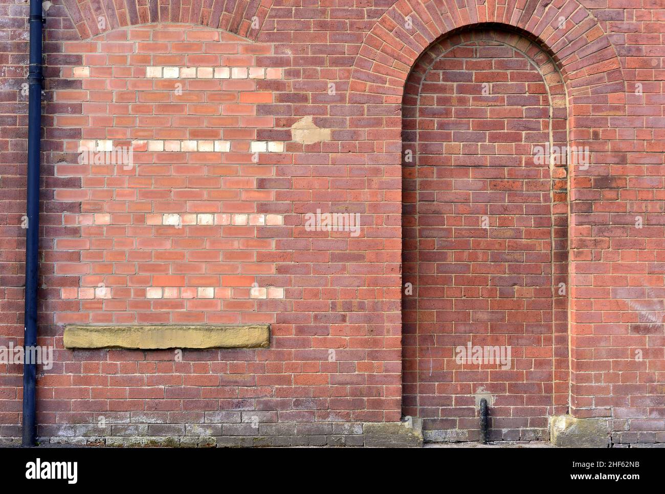 Porta e finestra in muratura a Oldham, Greater Manchester, Regno Unito. Foto Stock