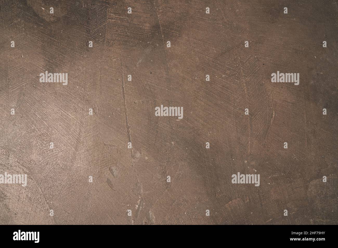 Calcestruzzo senza cuciture marrone scuro. Sfondo muro di pietra. Foto di alta qualità Foto Stock