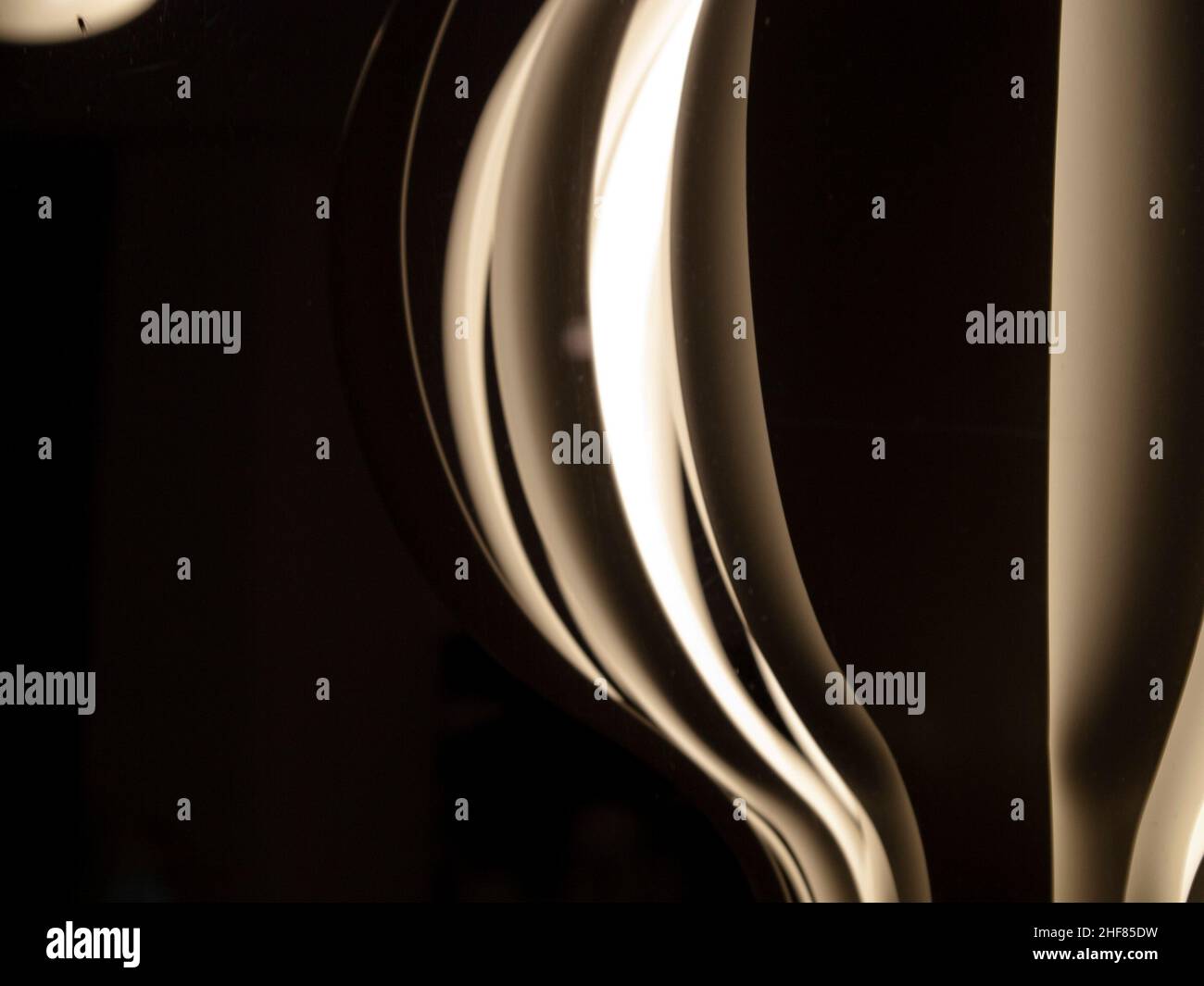 Lampada di design, luce e ombra, bagliore di luce Foto Stock