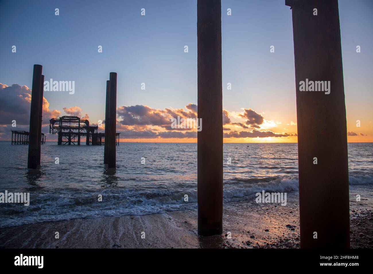 Molo ovest di Brighton al tramonto Foto Stock