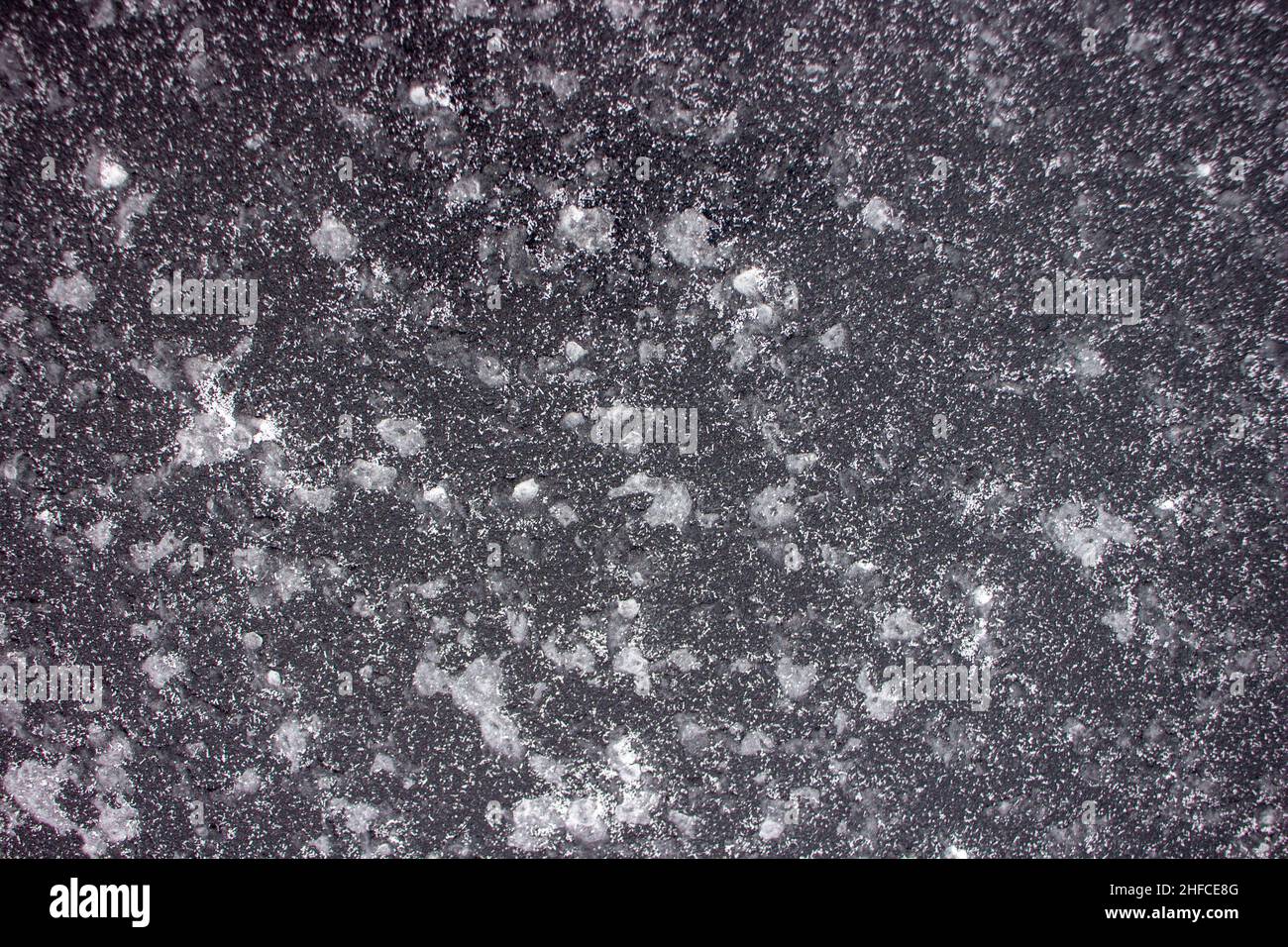 macchie bianche su sfondo nero. Texture. Foto Stock
