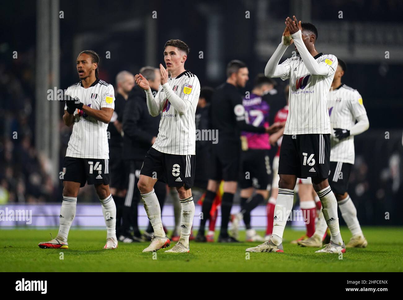 Fulham's Bobby Decordova-Reid, Harry Wilson e Tosin Adarabioyo celebrano la vittoria durante la partita del campionato Sky Bet al Craven Cottage di Londra. Data foto: Sabato 15 gennaio 2022. Foto Stock