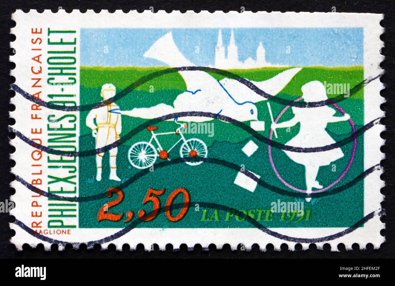 FRANCIA - CIRCA 1991: Un francobollo stampato in Francia mostra Bambini Playing, Youth Philatelic Exhibition, Cholet, circa 1991 Foto Stock