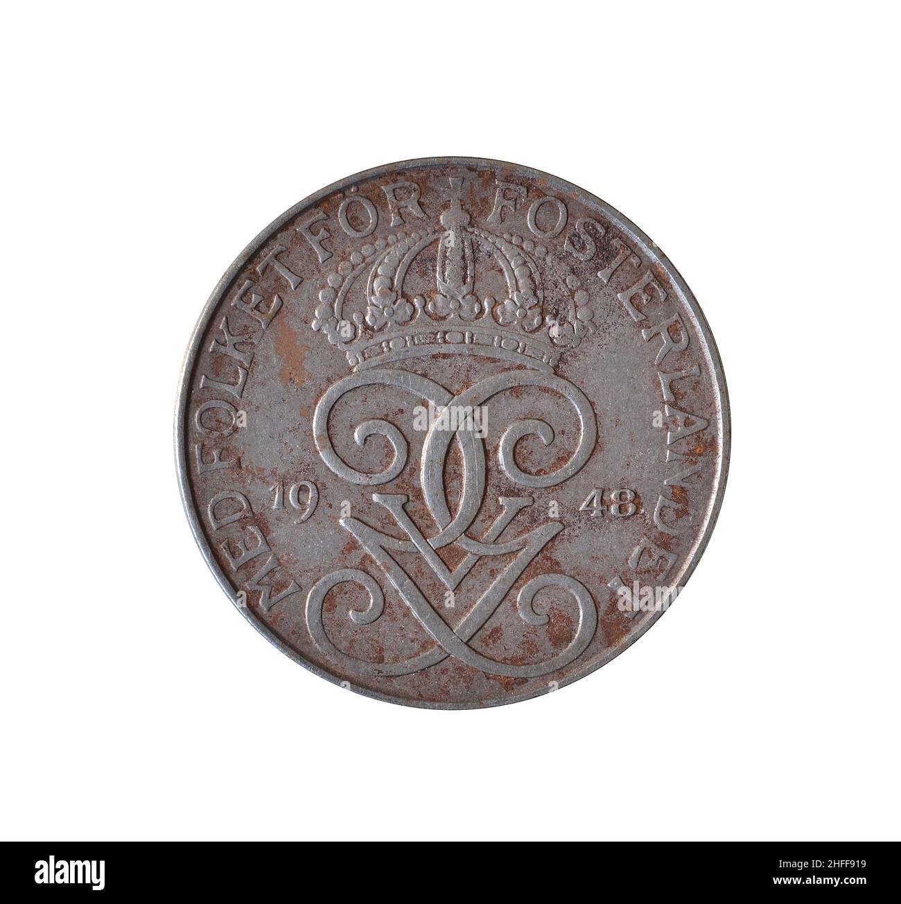 Cinque monete di Öre fatte dalla Svezia che mostra incoronato doppio monogramma del re Gustaf V di Svezia divide la data e il motto del re intorno al cerchio Foto Stock