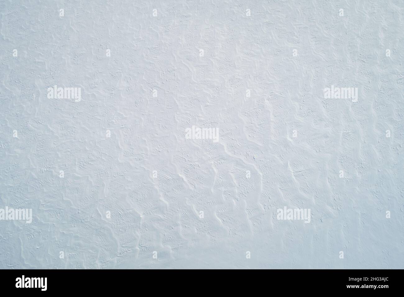 Motivo di neve fondo piatto sopra drone ampia vista Foto Stock