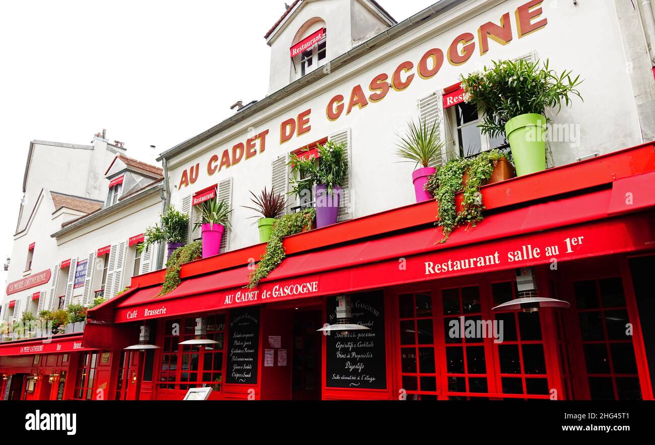 Facciata di Au Cadet de Gascogne, ristorante del quartiere Montmartre di Parigi Foto Stock