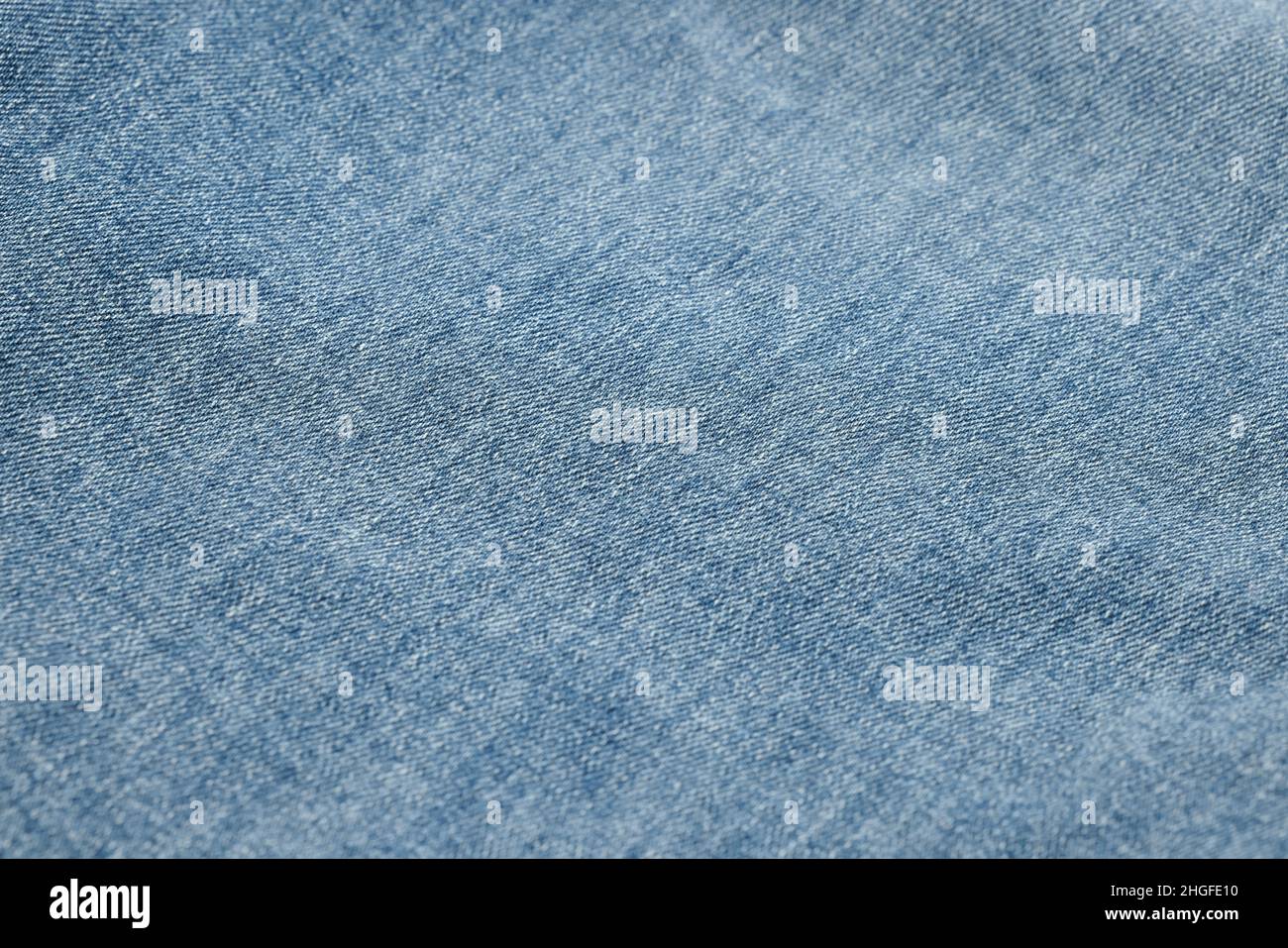 Sfondo e texture jeans blu. Primo piano di sfondo blu jeans. Texture denim. Foto Stock