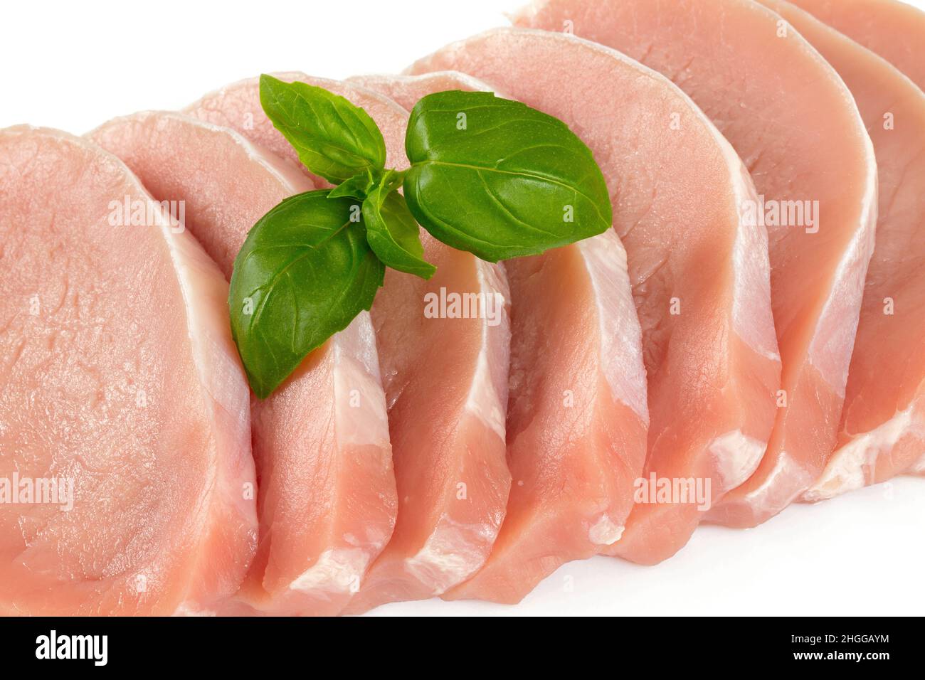 pezzi di maiale crudo isolati su sfondo bianco Foto Stock