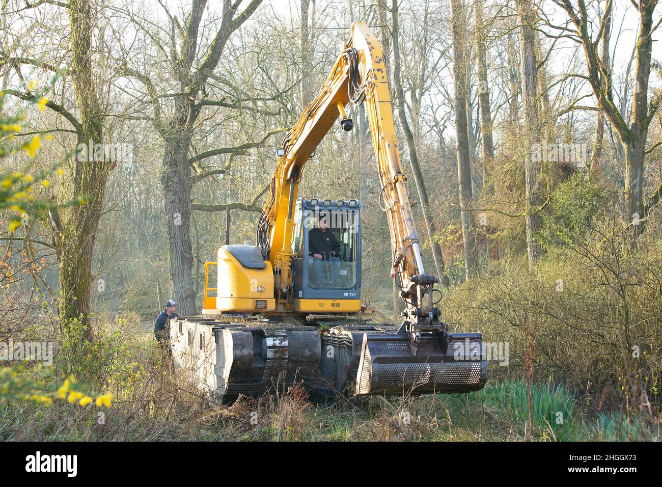 Escavatore a pala in pianura alluvionale, lavori di costruzione per la protezione contro le inondazioni, Belgio, Fiandre Orientali, Berlare, Berlare Broek Foto Stock