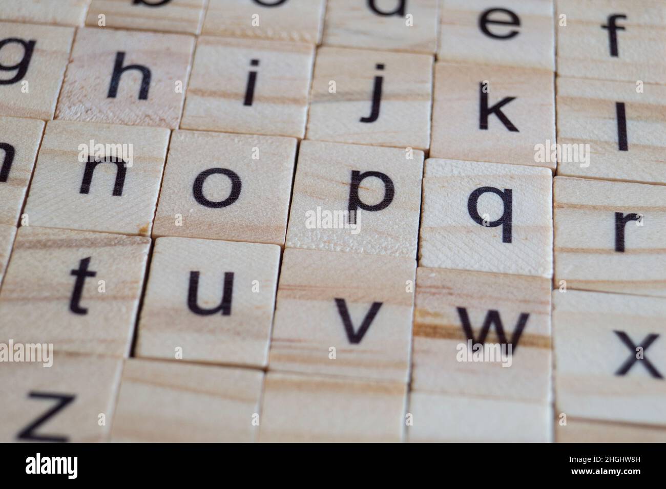 Alfabeto lettere su legno pezzi di Scrabble, close up Foto Stock