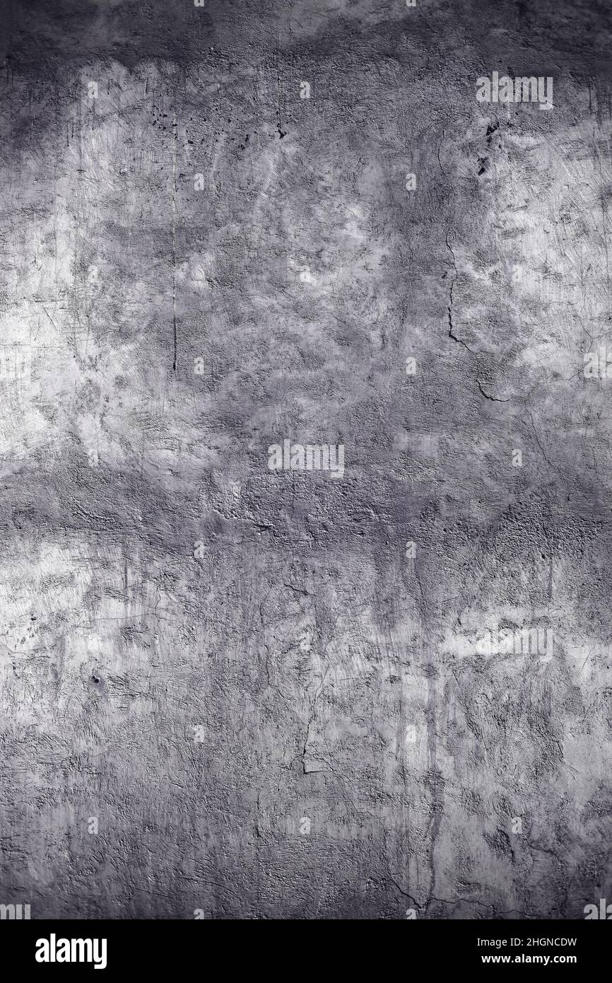 Parete in calcestruzzo grunge con crepe, fondo testurizzato. Foto Stock