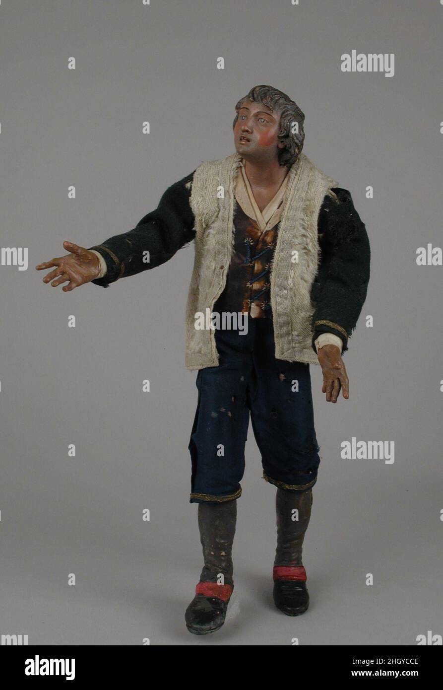 Giovane uomo in pelliccia giacca fine 18th - inizio 19th secolo italiano, Napoli. Giovane uomo in giacca in pelliccia. Italiano, Napoli. Fine 18th–inizio 19th secolo. Testa in terracotta policroma; arti in legno; corpo in filo avvolto in stoppa; indumenti in seta, lana e pelliccia; astuccio in pelle. Crèche Foto Stock
