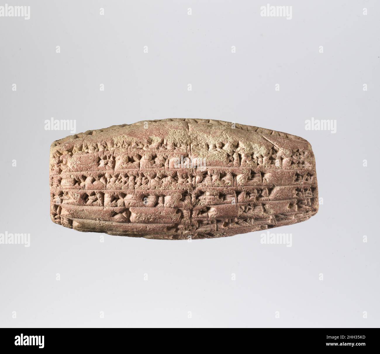 Cilindro cuneiforme con iscrizione di Nebuchadnetsar II che descrive la ricostruzione del tempio della dea madre Ninmah/Belet-ili a Babilonia ca. 604–562 a.C. Babilonia. Cilindro cuneiforme con iscrizione di Nebuchadnetsar II che descrive la ricostruzione del tempio della dea madre Ninmah/Belet-ili a Babilonia. Babilonese. Ca. 604–562 A.C. Argilla. Neo-babilonese. Mesopotamia, Babilonia (?) (Hillah moderno) Foto Stock