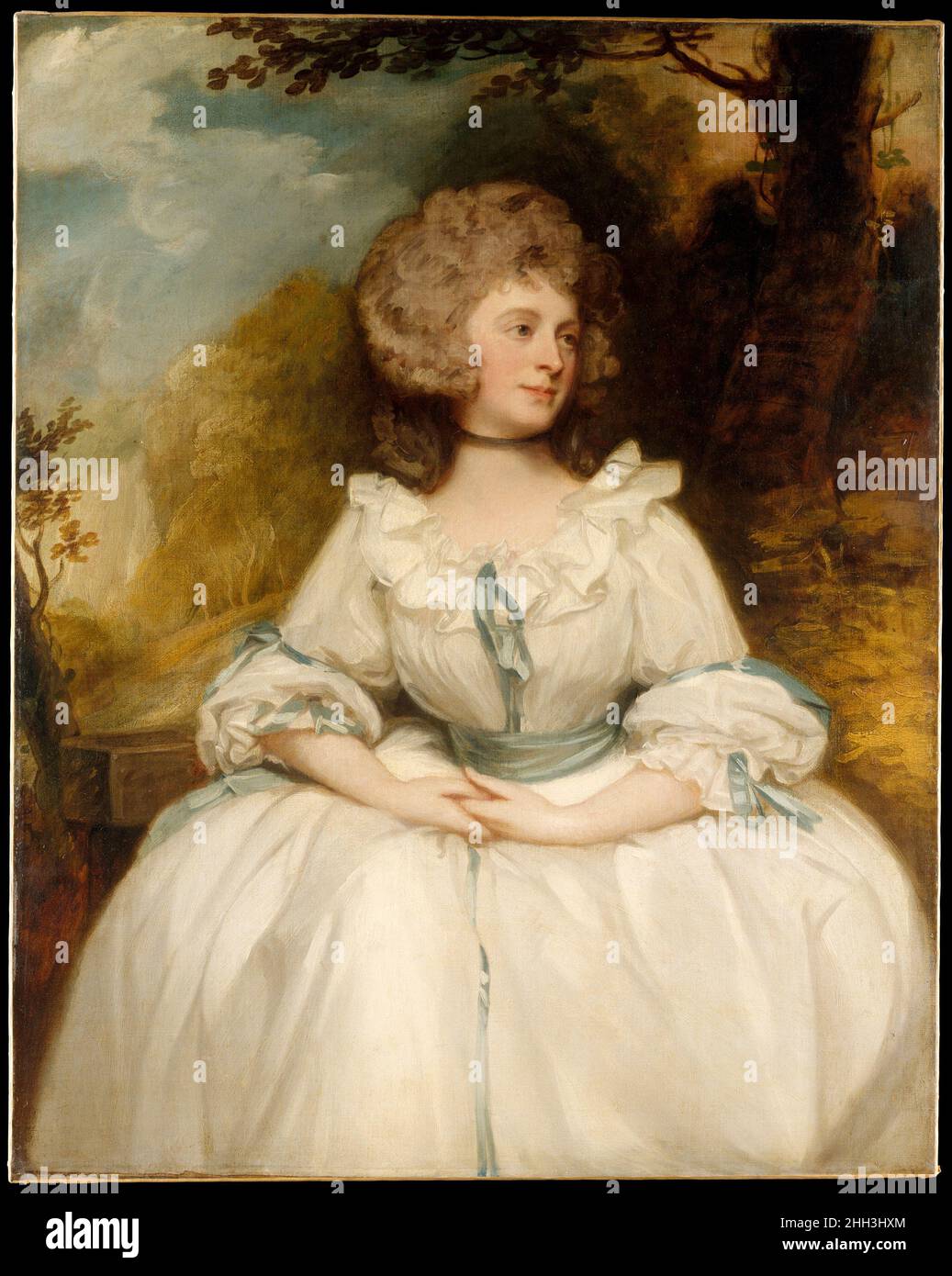 Lady Lemon (1747–1823) metà-fine 1780s George Romney British Jane Buller, il sitter in questo elegante ritratto, sposò William Lemon nel 1771 e portò dieci figli. Lord Lemon commissionò a George Romney di dipingere ritratti di sé e di sua moglie nel 1788, quando Lady Lemon aveva quarant'anni. Si è seduta per il dipinto in sei occasioni nello studio di Londra di Romney. La posa della seduta in una poltrona su sfondo paesaggistico divenne una convenzione comune nella successiva ritrattistica georgiana britannica. Romney ritrae il suo soggetto con un tocco dolce. Lady Lemon (1747–1823) 459127 Foto Stock