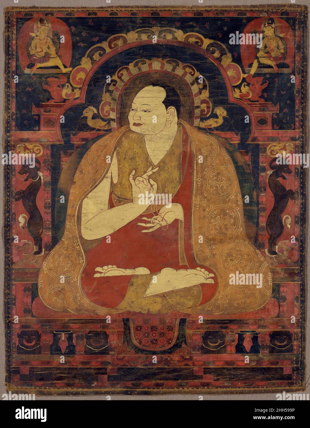 Ritratto di un lama, forse Dromton ultimo quarto del Tibet del 11th secolo questo lama intronata, in un accappatoio decorato in oro, si siede in una postura yoga, tenendo le mani in dharmachakra mudra, che simboleggia la svolta della ruota, il primo sermone del Buddha. L'elaborato ambiente architettonico è supportato da leoni e affiancato da due leogritici di allevamento su elefanti. Negli angoli superiori, due bodhisattvas espongono il dharma, i loro gesti della mano che riecheggiano quelli del lama predicatore. Un'iscrizione sul retro stabilisce che il ritratto apparteneva al Chengawa Tsultrim Bar. Con ogni probabilità è depic Foto Stock