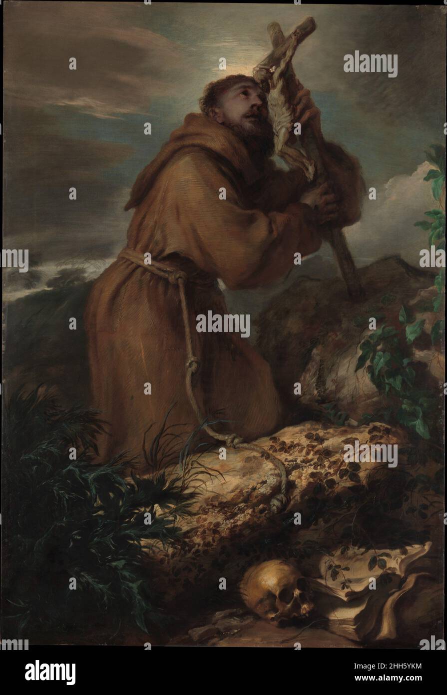 San Francesco in Ecstasy ca. 1650 Giovanni Benedetto Castiglione (il Grechetto) italiano con abito cappuccino, San Francesco (1181/82–1226) è raffigurato su un precipizio roccioso, sestato contro un cielo da sera. Fu famoso devoto a Cristo crocifisso ed è mostrato in uno stato di estasi. Il libro aperto e il cranio sono simboli delle vanità del mondo e della mortalità. Castiglione utilizza una tecnica ricca e variegata per segnare la transizione dal mondo materiale allo spirituale. La foto è stata dipinta a Roma, probabilmente come pala d'altare, anche se la sua posizione originale è sconosciuta. San Francesco Foto Stock