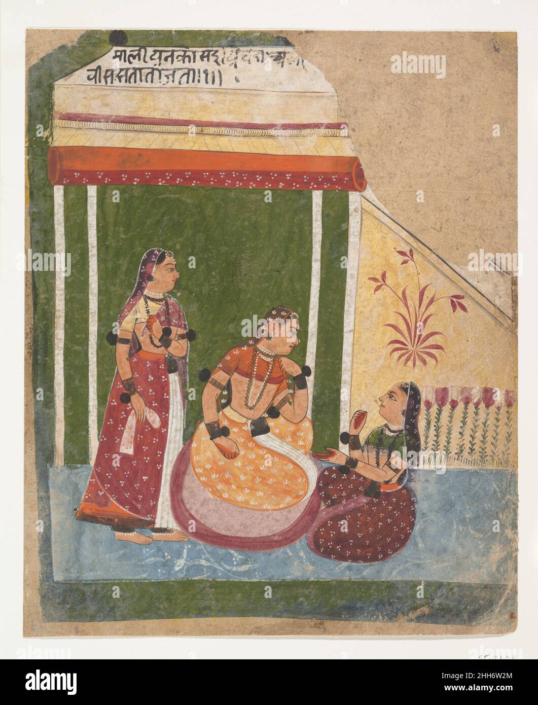 Ladies in a Pavilion: Pagina da una serie dispersa di Ragamala (Garland delle modalità musicali) ca. 1640–50 India (Rajasthan, Marwar) in questa pagina di Ragamala non identificata, due donne si siedono in conversazione mentre una terza guarda sopra. Il gusto di Marwari per i toni saturi della terra rossa e arancione e una presentazione formale sono perfettamente tipizzati. I fiori al di sopra della testa della donna inginocchiata indicano una consapevolezza delle forme Mughal. Si trovano anche chiare relazioni con i precedenti stili Rajput esemplificati nella Bhagavata Purana del 1520–40 (1985,34). (Questo dipinto fa parte della stessa serie Ragamala del 55.121.27 e del 55.121.29 Foto Stock