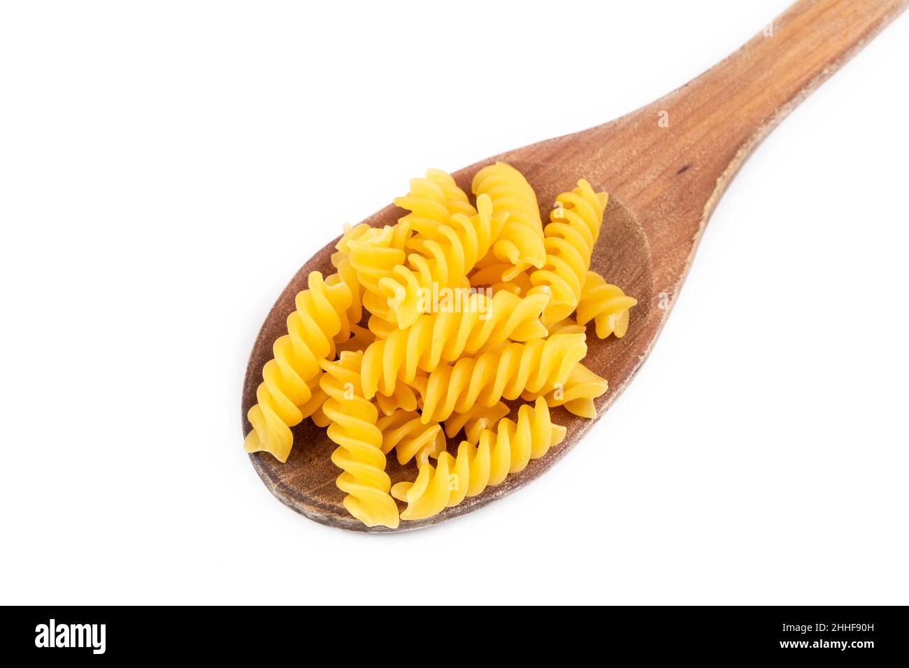Pasta a forma di vite su sfondo bianco Foto Stock