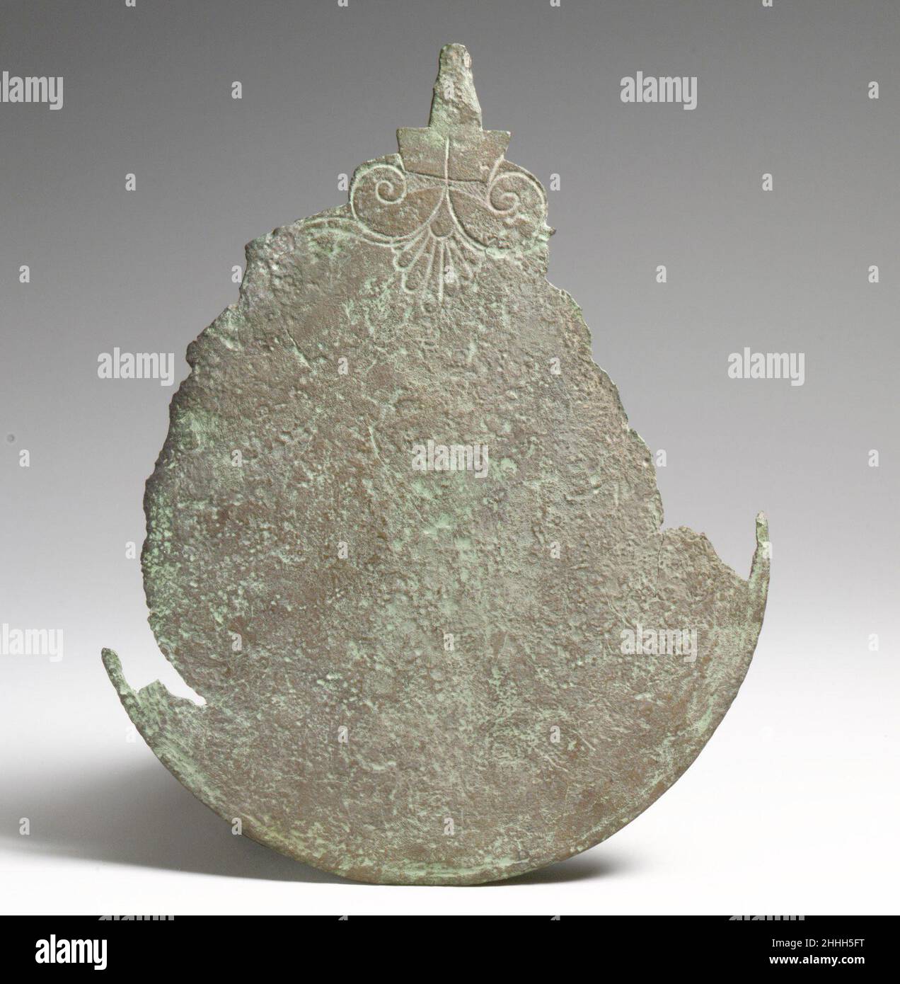 Specchio 6th secolo a.C. greco, cipriota. Speculare. Greco, cipriota. 6th secolo a.C. Bronzo. Bronzi Foto Stock