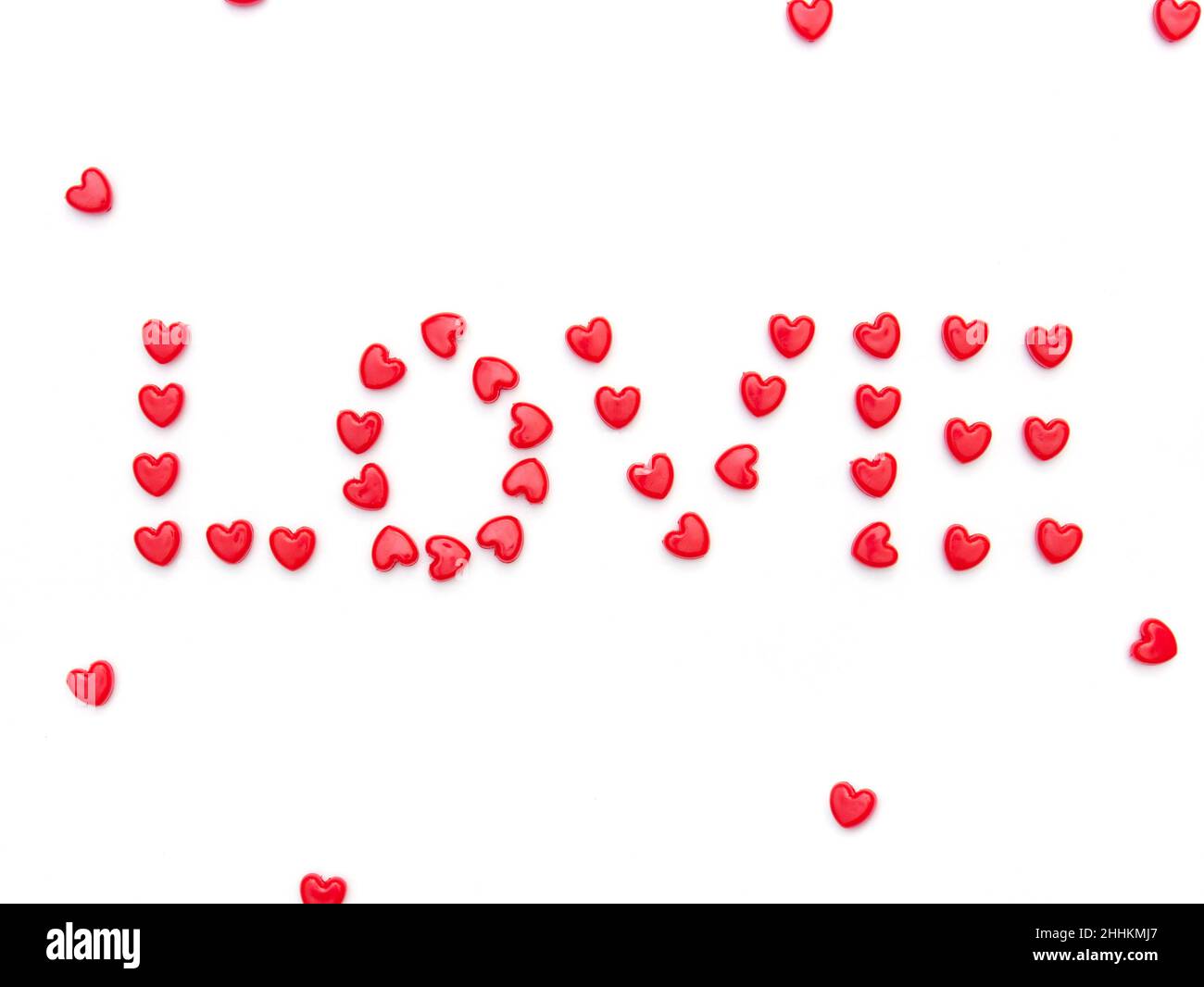 Love word stop motion su sfondo bianco per San Valentino e l'amore. Foto Stock