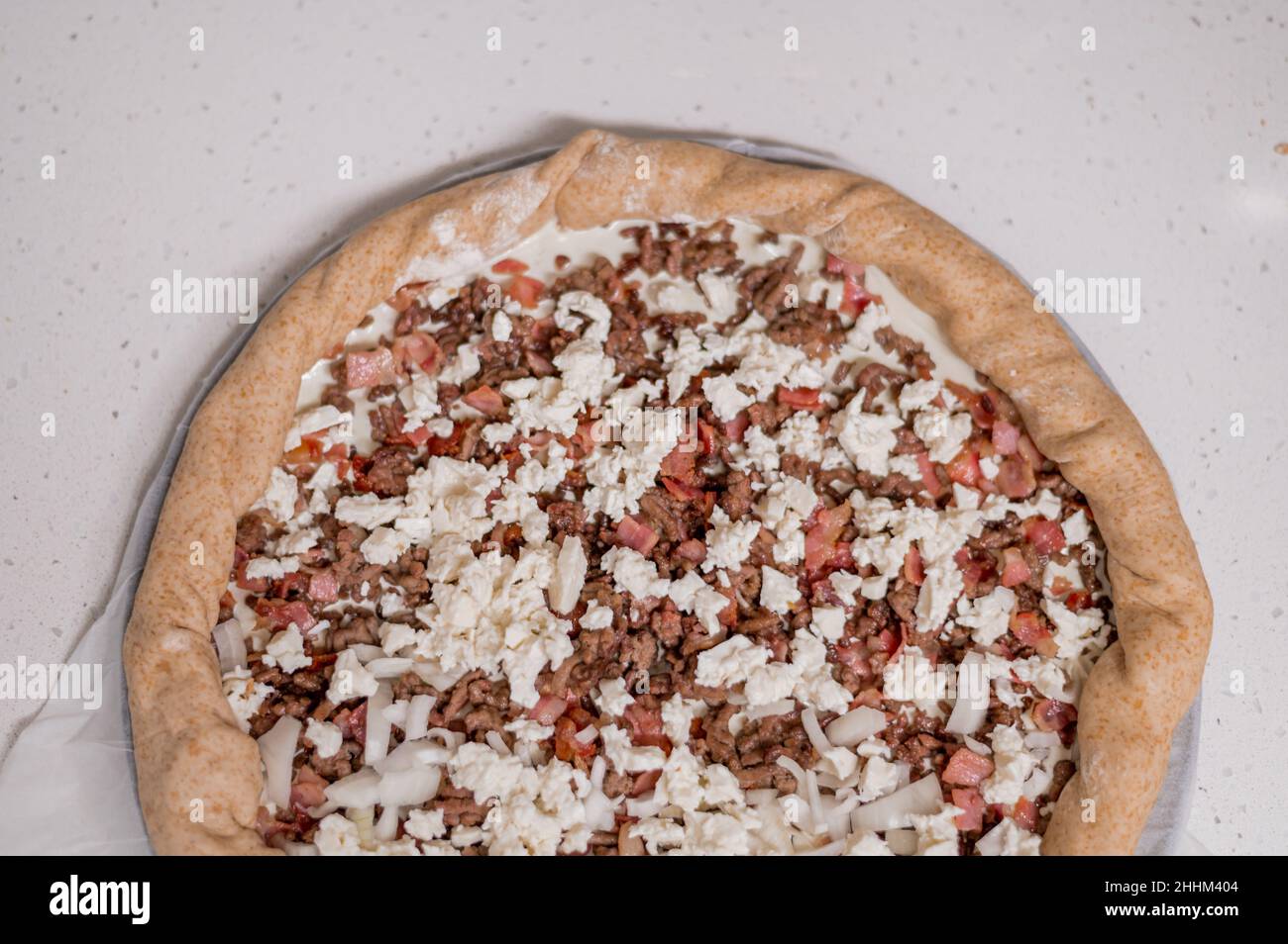 pizza fatta a mano casa legno mini Foto Stock