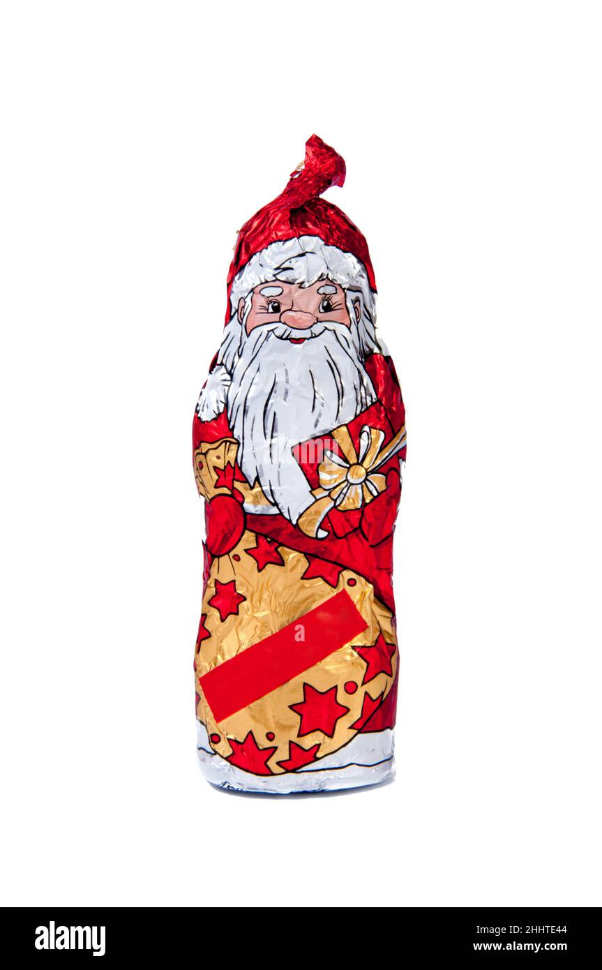 cioccolato babbo natale in lamina, regalo di natale vacanza isolato sul bianco Foto Stock