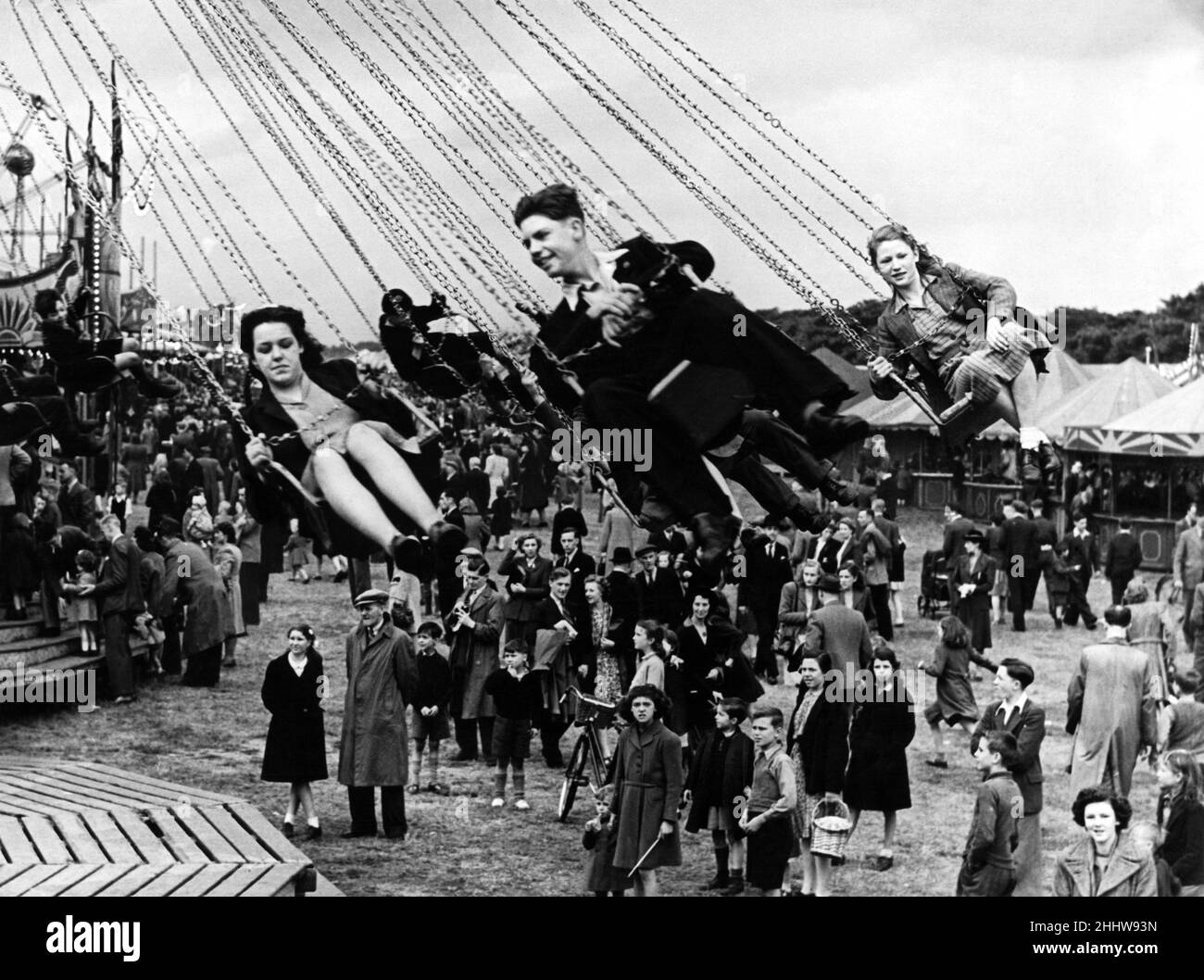 Il giro in sedia aerea alla fiera Hoppings, tenuta sul Moor Town a Newcastle upon Tyne, Tyne e Wear. 25th giugno 1947. Foto Stock
