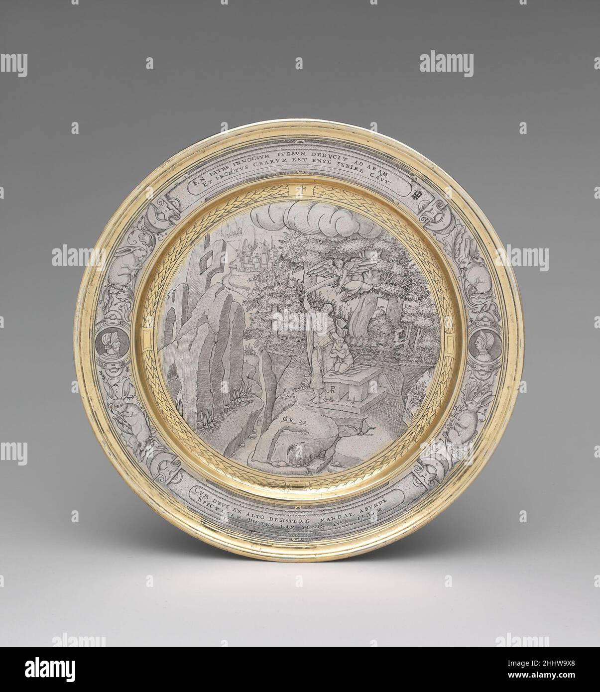 Il sacrificio di Isaac ca. 1567 eventualmente incisa da P.M. la fine incisione su questo set di lastre (65.260.1–.12) raffigura scene dell'Antico Testamento. L'incisore, che doveva essere stato addestrato sul Continente, basava le sue composizioni su illustrazioni in concordanza con la Bibbia, improvvisando dove necessario per riempire la cornice circolare offerta dalle lastre. I piatti e un pezzo relativo inciso con un ritratto della regina Elisabetta i devono essere stati fatti come un regalo a o dalla regina stessa. Il sacrificio di Isacco 204601 Foto Stock