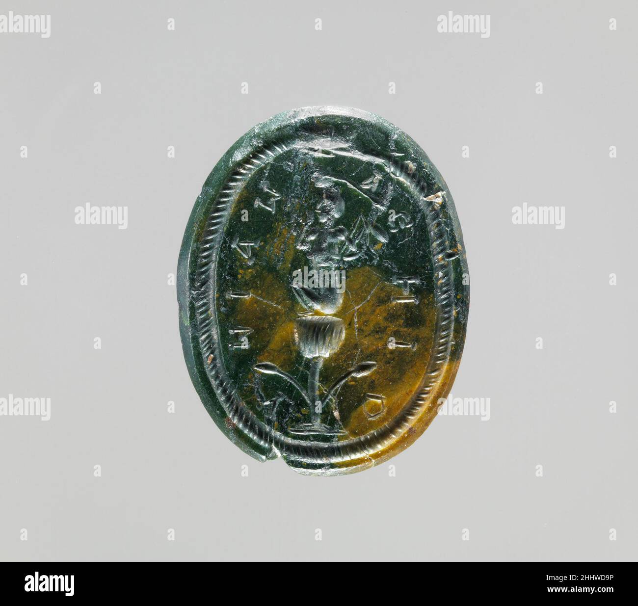 Intaglio di Jasper: Arpocrate seduti su un loto ca. 2nd–3rd secolo d.C. Amuleto romano: Ouroboros che racchiude Harpocrates seduti su un loto.. Intaglio di Jasper: Arpocrate seduti su un loto 253781 romano, intaglio di Jasper: Arpocrate seduti su un loto, ca. 2nd?3rd secolo d.C., Jasper, H.: 1 1/16 x 15/16 poll. (2,7 x 2,4 cm). Il Metropolitan Museum of Art, New York. Bequest of W. Gedney Beatty, 1941 (41.160.638) Foto Stock