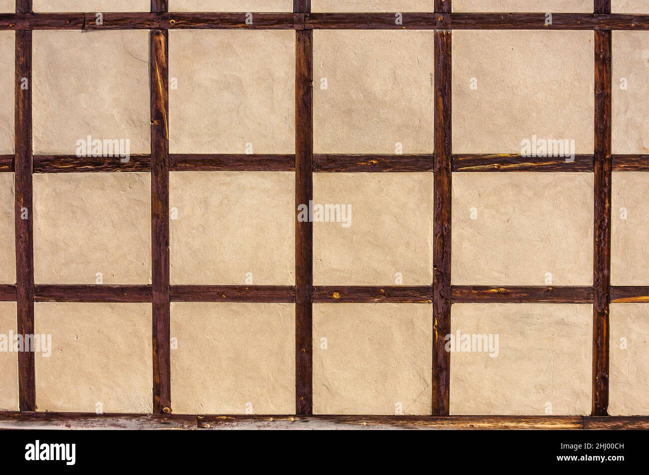 Modelli tratti dalle infuocazioni e strutture di un'architettura storica a graticcio. Foto Stock