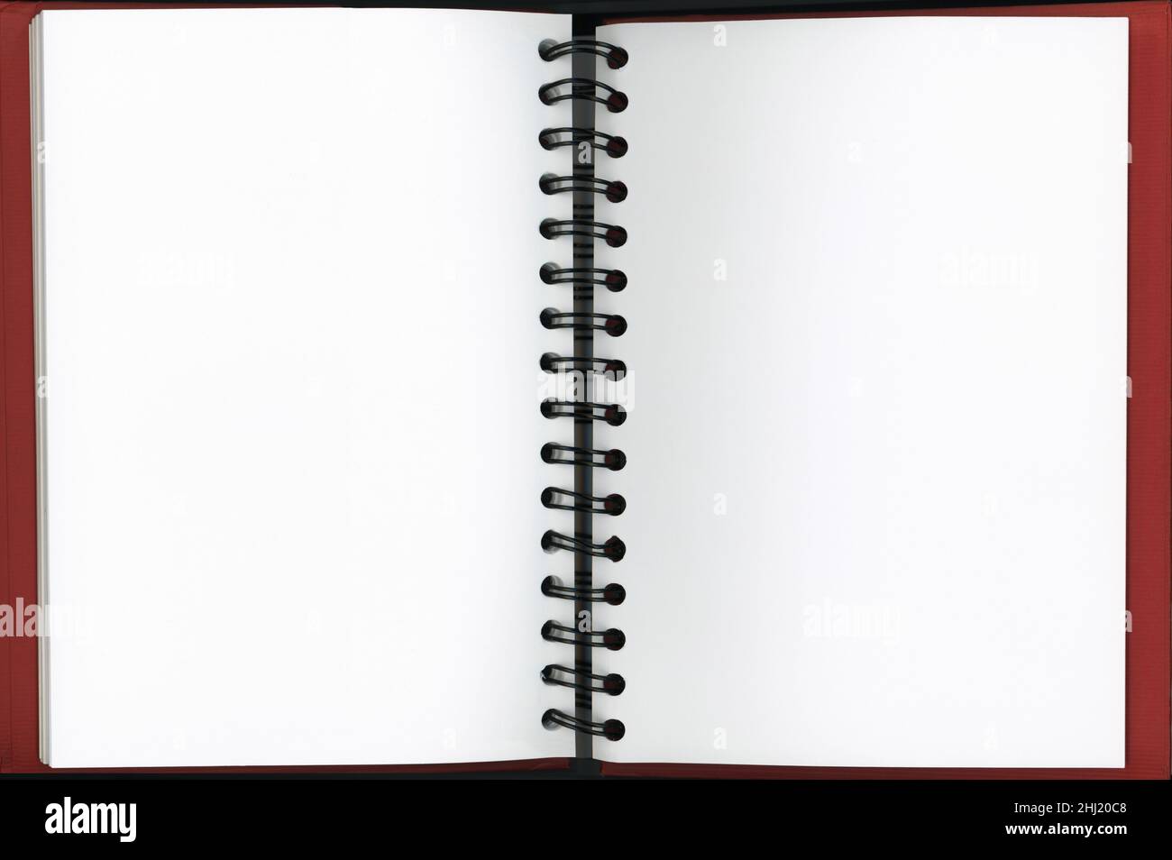 Libro di schizzo dell'artista delimitato da un anello vuoto con una copertina rosso-marrone Foto Stock