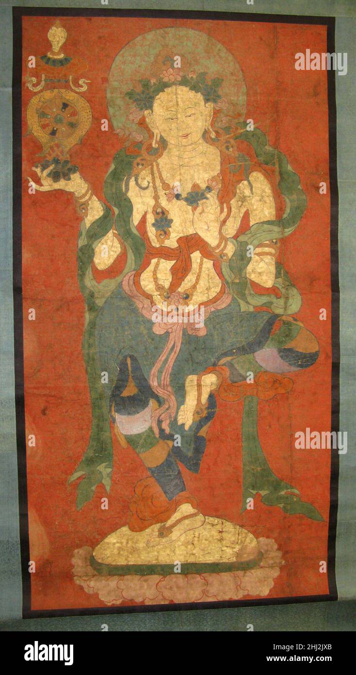 Assistente buddista, forse un dakini fine 18th secolo Tibet orientale questa dea danzante, forse destinata a rappresentare un'essere femminile perfezionata (dakini), onora la ruota buddista della saggezza (dharmachakra), che tiene nella sua destra, fiancheggiata da pesci d'oro e sormontata da una conca, simboli di auspicie. Nella sua sinistra ha un fiore di loto, che può relazionarla al bodhisattva Avalokiteshvara. Questo foglio faceva parte di una composizione più grande (ora persa). Assistente buddista, forse un dakini 37819 Foto Stock