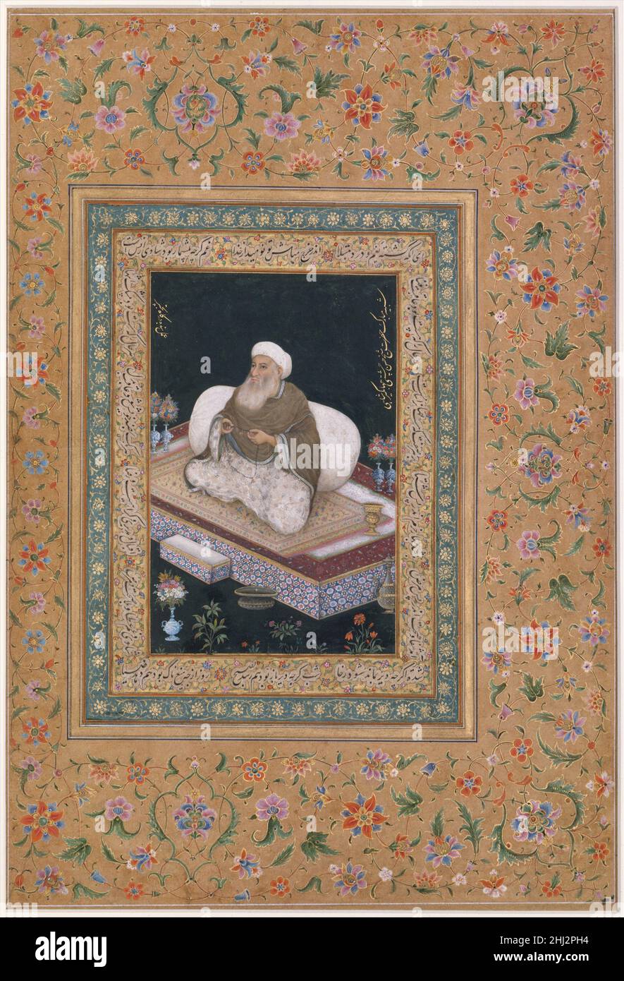 'Ritratto di Shaikh Mu'in al-DIN Hasan Chishti', Folio dal Shah Jahan Album recto e verso: Inizio 19th secolo questo ritratto di un sufi è identificato lungo il bordo destro come la somiglianza di Shaikh Mu`in al-DIN Hasan Chishti (1141–1230), un membro importante dell'ordine Chishtiyya sufi. Fondata a Chisht, una piccola città vicino a Herat, Afghanistan nel 930, l'ordine Chishtiyya Sufi si espanse in India quando Mu'in al-DIN Hasan Chishti vi viaggiò nel 1193. La sua presenza in India portò ad un'espansione dell'Ordine Chishti nel subcontinente indiano, che continuò a fiorire molto dopo la sua de Foto Stock