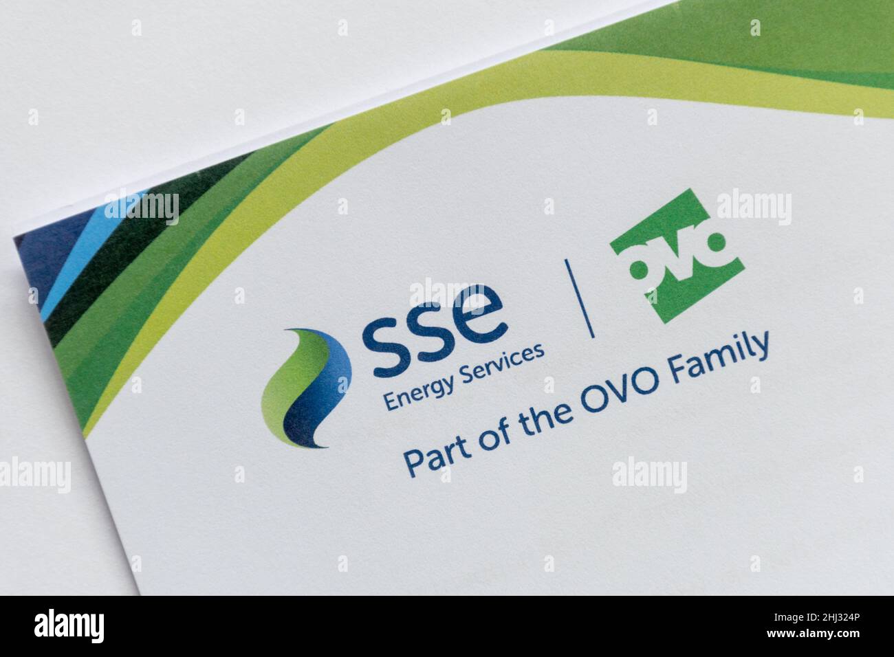 Lettera di SSE Energy Services, parte della famiglia OVO, logo SSE e logo OVO Foto Stock